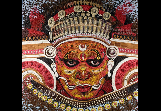 Kerala Artist creates 24-foot-long Theyyam Mascot from 25,000 biscuits