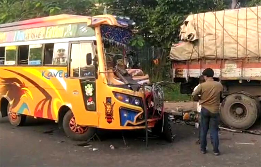 bus collides with parked lorry