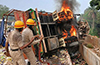 Lorry Carrying Soft Drinks Overturns and Catches Fire on NH-75 Near Maani