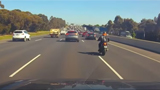 On camera, biker lands on car roof after high-speed collision