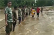 Chhattisgarh: CRPF jawans form human chain to assist people in flood-hit Sukma