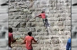 Video: Man attempts to scale Karnataka dam wall, falls down 30 feet