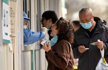 China reports 20,000 daily Covid cases, highest since start of pandemic