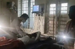 Karnataka Doctor examines patient using mobile torch amid power cut, Watch