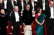 Dressed in dhoti and sari, Abhijit Banerjee and Esther Duflo receive Economics Nobel