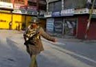 Curfew-bound Kashmir calm but tense after Gurus hanging