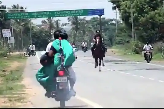 Karnataka BJP MLAs son defies lockdown to ride horse without mask on highway, Video goes viral