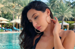 Nora Fatehi makes every pool day a fantastic one with one of her stylish black swimsuits