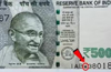 Currency note with * symbol in number panel valid note: RBI