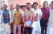 Assam Congress MLAs wear onion garlands to protest against price rise