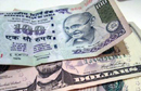 Rupee crashes to 65.50 against dollar, hits record low