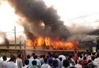 Train set on fire after nine students killed in Bihar accident