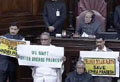 Telangana bill not taken up in RS, high drama in House