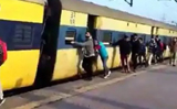 Fire breaks out in train, passengers push train away from burning engine, watch