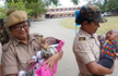 Assam police officers take care of babies while their mothers write TET exam