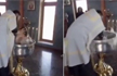 2-Year-old girl violently Baptised by a Russian Priest