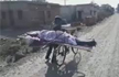 After neighbours refuse to help, boy carries dead mother on cycle