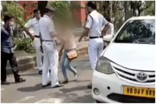 Woman licks cop to scare him with Coronavirus after he stops her Car in Kolkata