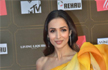 Malaika Arora is a vision in high-slit satin gown