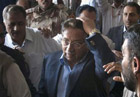 Court bars Musharraf from leaving Pak; shoe thrown at him