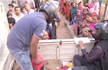 Fearing stampede, Patna officials wear helmets while selling onion for Rs 35/kg