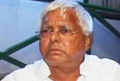 A day after revolt, Lalu Prasad parades 9 MLAs, claims all is well