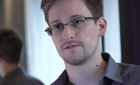 Edward Snowden slips out of Moscow airport for secret location