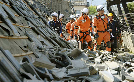 Two powerful earthquakes a day apart shook southwestern Japan, killing at least 29 people, trapping many